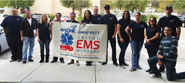 Members of United EMS Workers-AFSCME Local 4911 gather before delivering petition to AMR demanding respect. Photo Credit: Ashley Mates